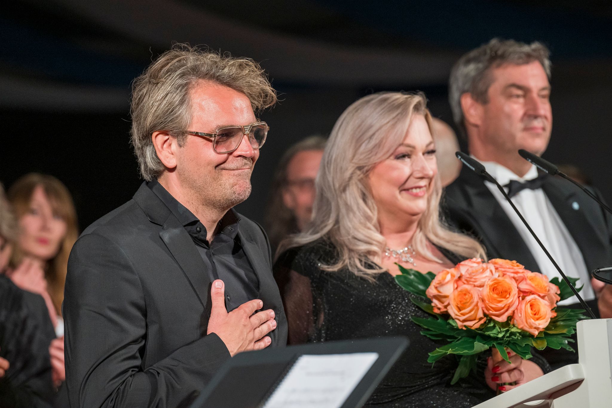 «Tristan»-Regisseur Arnarsson, Festivalchefin Wagner, Ministerpräsident Söder (l-r). (Archivbild) Foto: Daniel Vogl/dpa